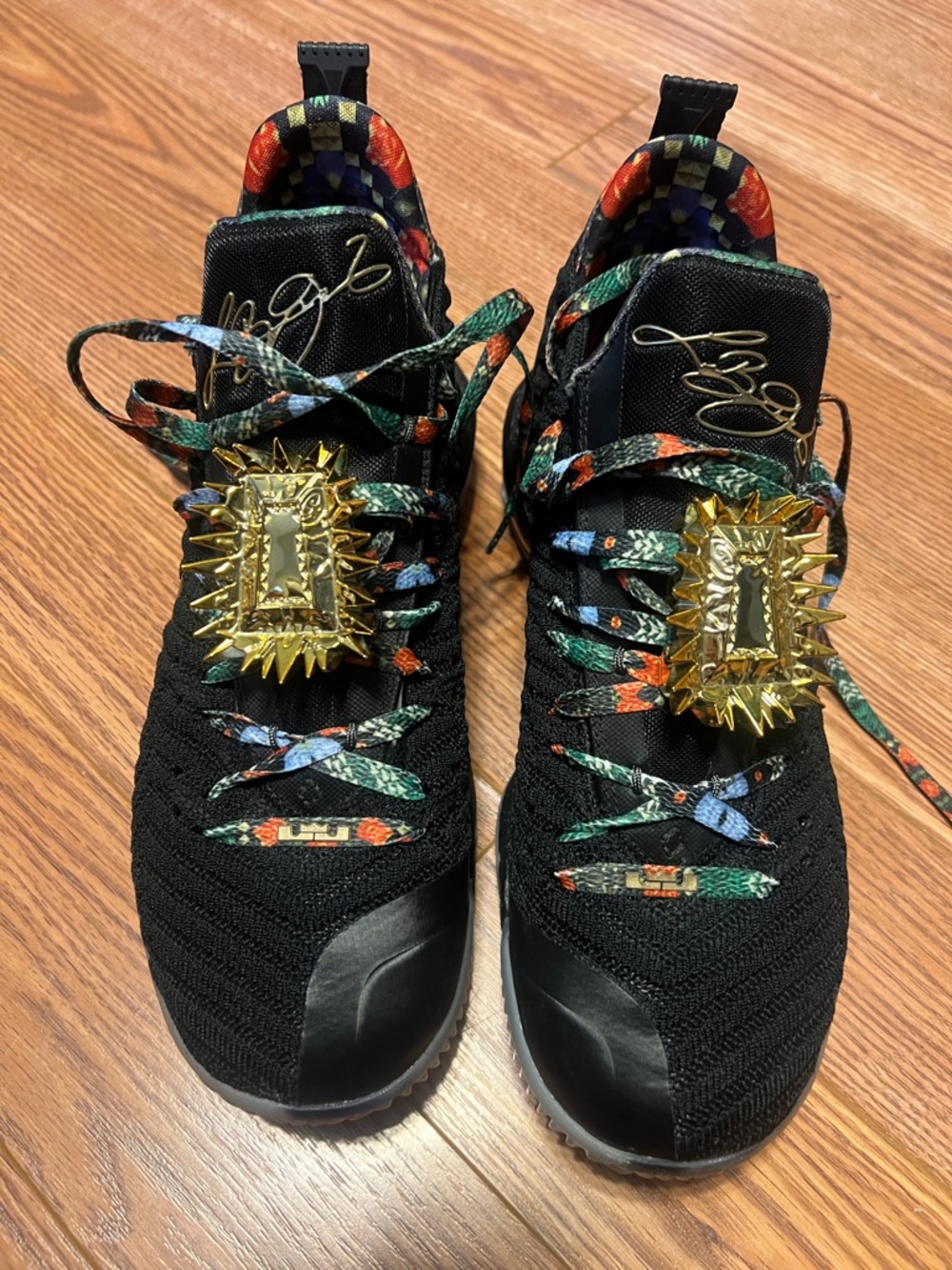 Men's Black Athletic Sneakers with Multicolor Accents and Gold Hardware